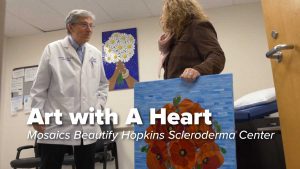 Dr Wigley and Donor with Mosaics for Hopkins Scleroderma Center